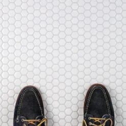 Merola Tile Metro Hex Glossy White 10-1/4 In. X 11-3/4 In. X 5 Mm Porcelain Mosaic Tile (8.56 Sq. Ft. / Case) 28 Merola Tile Metro Hex Glossy White 10-1/4 In. X 11-3/4 In. X 5 Mm Porcelain Mosaic Tile (8.56 Sq. Ft. / Case) -Discount Flooring Store 050e5d956494df4e286735c22aefb141 1800x1800
