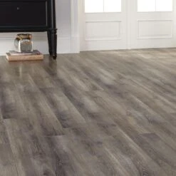 TrafficMaster Alverstone Oak 8 Mm Thick X 6-1/8 In. Wide X 47-5/8 In. Length Laminate Flooring (20.32 Sq. Ft. / Case) -Discount Flooring Store 5b11117e3ea9df07b6dc868100ef80a5 1800x1800