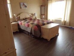 BuildDirect Tupelo 12mm 48" X 7.68" Laminate Flooring (12.76sq. Ft. Per Box) -Discount Flooring Store 5b8afbcd 3a3f 4d72 873e 4cd7271cedf7 2.175360279aa5db99bac5353342ccb58d 1800x1800