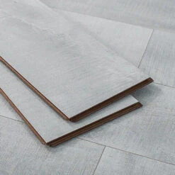 BuildDirect Pristine White 12mm 72" X 7.7" Laminate Flooring (23.09sq. Ft. Per Box) -Discount Flooring Store 9fe9da7d ac31 4ed6 855c f3282e030052 1.b5233ec37d3383882f2e82849e4873da 1800x1800