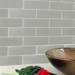 MSI Pebble 3 In. X 9 In. X 8mm Glossy Glass Gray Subway Tile (3.8 Sq. Ft. /case) 27 MSI Pebble 3 In. X 9 In. X 8mm Glossy Glass Gray Subway Tile (3.8 Sq. Ft. /case) -Discount Flooring Store ae5a16ca84dcf8643357cc0dd76ee37a 1800x1800