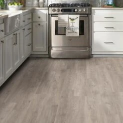 TrafficMaster Taupe Oak 6 In. X 36 In. Peel And Stick Vinyl Plank (36 Sq. Ft. / Case) -Discount Flooring Store aed22eb41f1a87bcee3d3af5ec538071 1800x1800