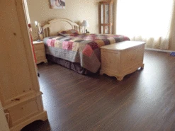 BuildDirect Tupelo 12mm 48" X 7.68" Laminate Flooring (12.76sq. Ft. Per Box) -Discount Flooring Store dd4e7723 2793 430b 9a2c f1a6eaedd96c 2.f54bdd87b5339e73f3eb143ce729a1da 1800x1800