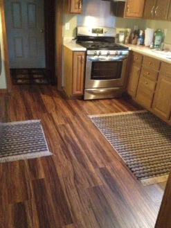 BuildDirect Balinese Rosewood 12mm 48" X 6.5" Laminate Flooring (15.1sq. Ft. Per Box) -Discount Flooring Store e034d768 2fe5 4893 b7da df1882a390eb 1.8c75a08b50661f0627256cae8b351d0d 1800x1800